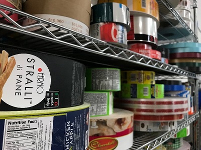 Rolls of banding material on shelves