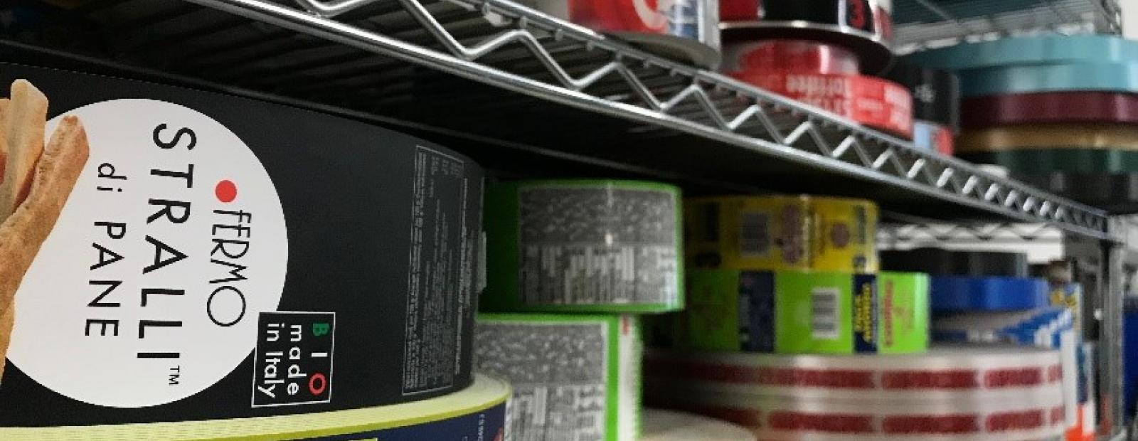 Rolls of banding material on shelves