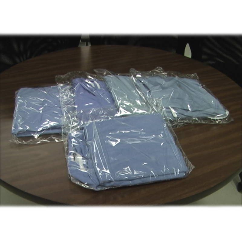 Security overwrapping, shrink wrapping, gowns