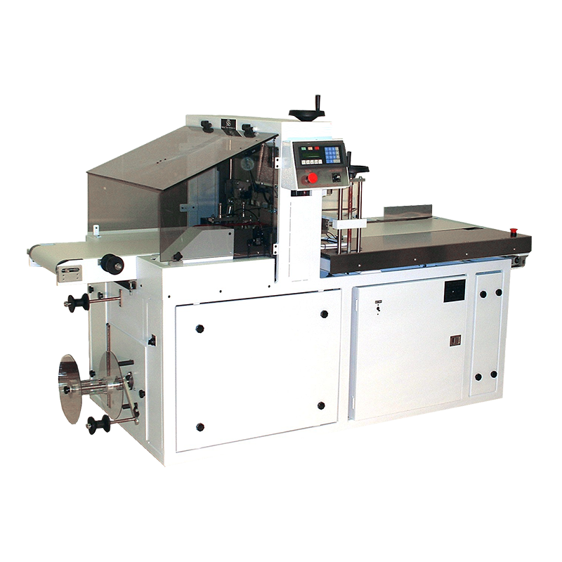 Shrink wrapping machine, automated shrink wrapper, lower profile wrapper, laundry wrapper